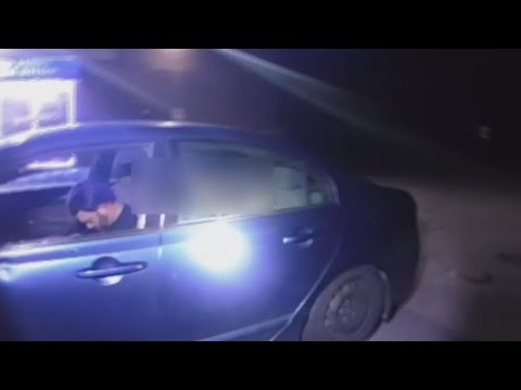 Man found sleeping in car with 4 guns, crystal meth and son in backseat in Michigan